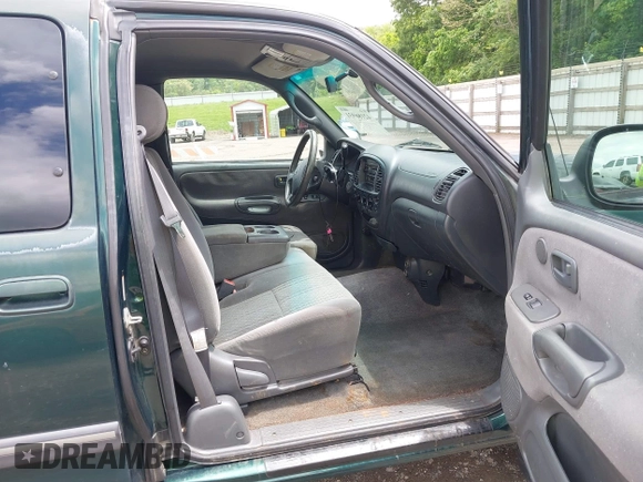 2003 Toyota Tundra SR5 with VIN 5TBRT34143S434712, listed as a IAAI auction lot 42186931 with 380,102 mi miles and . Bid and sale history available at DreamBid. Image 5.