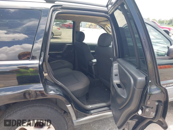 2002 Jeep Grand Cherokee Laredo with VIN 1J4GX48S22C226527, listed as a IAAI auction lot 42630457 with 197,333 mi miles and . Bid and sale history available at DreamBid. Image 8.