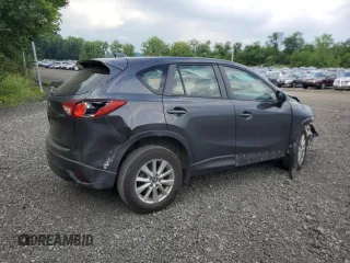 2015 Mazda CX-5 Sport with VIN JM3KE4BYXF0511249, listed as a Copart auction lot 63310695 with 208,615 mi miles and Salvage title. Bid and sale history available at DreamBid. Image 3.