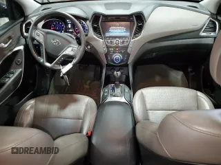 2014 Hyundai Santa Fe z VIN 5XYZUDLB0EG200376, wystawiony jako Copart lot #53634165 z przebiegiem 64 561 mil mil oraz Szkoda całkowita • Salvage title. Historia ofert i sprzedaży dostępna na DreamBid. Obrazek 8.