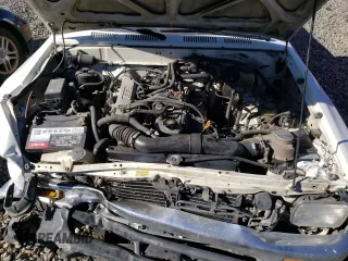 1994 Toyota Pickup DX z VIN JT4RN81P0R5200010, wystawiony jako Copart lot #89184805 z przebiegiem 123 270 mil mil oraz Szkoda całkowita • Salvage title. Historia ofert i sprzedaży dostępna na DreamBid. Obrazek 11.