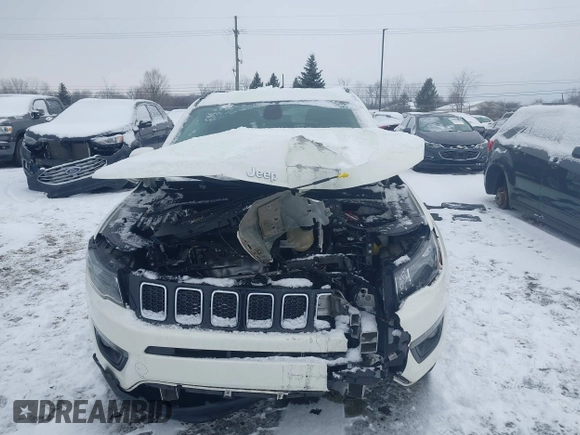 2019 Jeep Compass Latitude with VIN 3C4NJDBBXKT647665, listed as a IAAI auction lot 41327220 with 41,957 mi miles and . Bid and sale history available at carsss.com. Image 6.