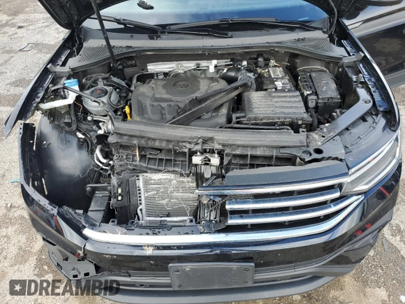 2023 Volkswagen Tiguan SE with VIN 3VVNB7AX2PM058818, listed as a Copart auction lot 55518755 with 35,878 mi miles and Salvage title. Bid and sale history available at DreamBid. Image 12.