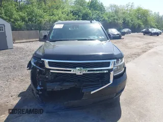 2020 Chevrolet Tahoe LT with VIN 1GNSKBKCXLR255963, listed as a IAAI auction lot 42127845 with 46,746 mi miles and . Bid and sale history available at DreamBid. Image 12.
