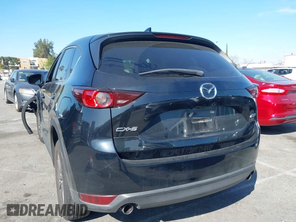 2017 Mazda CX-5 Touring with VIN JM3KFACL2H0146213, listed as a IAAI auction lot 41626112 with 77,829 mi miles and . Bid and sale history available at carsss.com. Image 3.