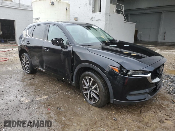 2018 Mazda CX-5 Touring z VIN JM3KFBCM4J0377280, wystawiony jako Copart lot #56688575 z przebiegiem 101 167 mil mil oraz Czysty tytuł • Clean title. Historia ofert i sprzedaży dostępna na DreamBid. Obrazek 4.