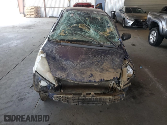 2009 Honda Fit with VIN JHMGE872X9S036722, listed as a Copart auction lot 64701315 with 197,305 mi miles and Non repairable. Bid and sale history available at DreamBid. Image 5.