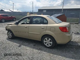 2011 Kia Rio with VIN KNADH4B30B6712241, listed as a Copart auction lot 61301184 with 159,902 mi miles and Salvage Title. Bid and sale history available at DreamBid. Image 2.