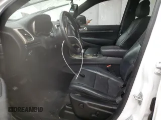 2015 Jeep Grand Cherokee Summit with VIN 1C4RJFJG9FC794992, listed as a Copart auction lot 42790355 with 74,044 mi miles and Salvage Title. Bid and sale history available at DreamBid. Image 7.