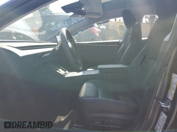 2025 Tesla Model 3 Long Range with VIN 5YJ3E1EA8SF896333, listed as a Copart auction lot 61876445 with 5,690 mi miles and Salvage title. Bid and sale history available at DreamBid. Image 7.
