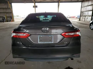 2019 Toyota Camry LE with VIN 4T1B11HK3KU290548, listed as a Copart auction lot 48233685 with 105,700 mi miles and Salvage Title. Bid and sale history available at carsss.com. Image 6.