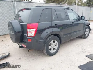 2006 Suzuki Grand Vitara Xsport with VIN JS3TE944364102783, listed as a IAAI auction lot 41996419 with 212,944 mi miles. Bid and sale history available at carsss.com. Image 4.