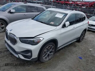 2021 BMW X1 xDrive28i z VIN WBXJG9C09M5T94206, wystawiony jako IAAI lot #42498235 z przebiegiem 62 079 mil mil oraz . Historia ofert i sprzedaży dostępna na DreamBid. Obrazek 2.
