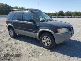 2002 Ford Escape XLT Choice with VIN 1FMYU041X2KE10205, listed as a Copart auction lot 74046214 with 282,858 mi miles and Salvage Title. Bid and sale history available at carsss.com. Image 4.