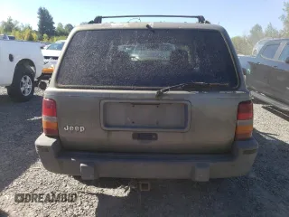 1995 Jeep Grand Cherokee Laredo with VIN 1J4FX58S1SC754691, listed as a Copart auction lot 72858214 with 251,234 mi miles and Salvage Title. Bid and sale history available at carsss.com. Image 6.