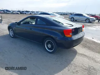 2000 Toyota Celica GT z VIN JTDDR32T1Y0053060, wystawiony jako IAAI lot #41572670 z przebiegiem 258 437 mil mil oraz . Historia ofert i sprzedaży dostępna na DreamBid. Obrazek 3.