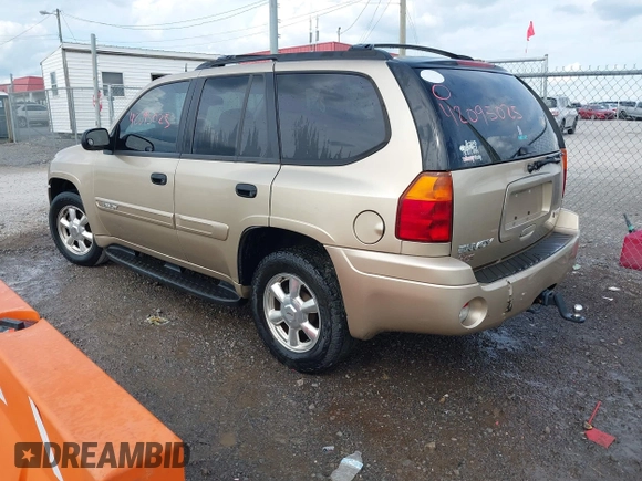 2005 GMC Envoy SLT with VIN 1GKDS13S452141376, listed as a IAAI auction lot 42095025 with 198,911 mi miles and . Bid and sale history available at DreamBid. Image 3.