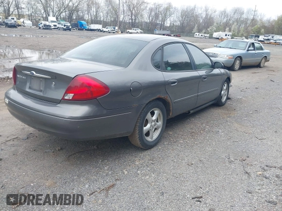 2003 Ford Taurus SES Standard with VIN 1FAFP55U43A261182, listed as a IAAI auction lot 42020172 with 118,000 mi miles. Bid and sale history available at carsss.com. Image 4.