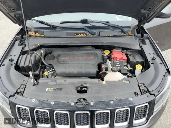 2019 Jeep Compass Latitude z VIN 3C4NJDBB8KT850859, wystawiony jako Copart lot #62680455 z przebiegiem 34 626 mil mil oraz Szkoda całkowita • Salvage title. Historia ofert i sprzedaży dostępna na DreamBid. Obrazek 12.