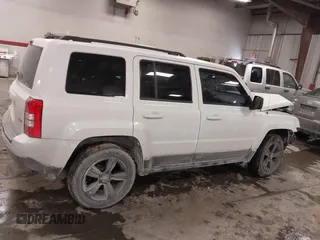 2014 Jeep Patriot Latitude with VIN 1C4NJRFB4ED864114, listed as a IAAI auction lot 41639732 with 103,119 mi miles. Bid and sale history available at carsss.com. Image 13.