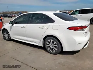 2022 Toyota Corolla Hybrid LE with VIN JTDEAMDE4NJ040406, listed as a Copart auction lot 48586865 with 81,098 mi miles and Salvage Title. Bid and sale history available at carsss.com. Image 2.