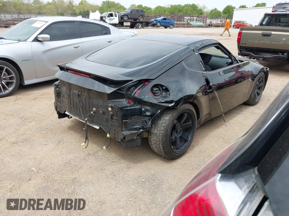 2016 Nissan 370Z with VIN JN1AZ4EHXGM935774, listed as a IAAI auction lot 41976743 with 66,979 mi miles. Bid and sale history available at carsss.com. Image 4.