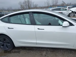 2022 Tesla Model 3 Long Range with VIN 5YJ3E1EB6NF272009, listed as a IAAI auction lot 41984154 with 12,651 mi miles and . Bid and sale history available at DreamBid. Image 13.