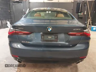 2022 BMW 4 Series 430i xDrive with VIN WBA73AP05NCJ87742, listed as a IAAI auction lot 36773839 with 20,814 mi miles and . Bid and sale history available at carsss.com. Image 16.