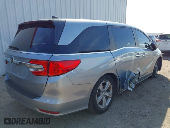 2019 Honda Odyssey EX-L with VIN 5FNRL6H79KB043145, listed as a IAAI auction lot 41569198 with 94,560 mi miles. Bid and sale history available at carsss.com. Image 4.