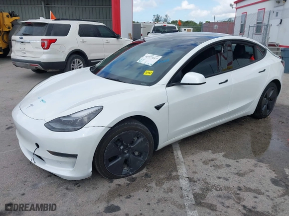 2023 Tesla Model 3 with VIN 5YJ3E1EA6PF595051, listed as a IAAI auction lot 41577257 with 1 mi miles. Bid and sale history available at carsss.com. Image 16.