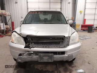 2005 Honda Pilot EX-L with VIN 2HKYF18575H557005, listed as a IAAI auction lot 41647830 with 245,992 mi miles. Bid and sale history available at carsss.com. Image 12.