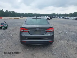 2017 Ford Fusion SE z VIN 3FA6P0HD6HR174945, wystawiony jako IAAI lot #42416548 z przebiegiem 128 410 mil mil oraz . Historia ofert i sprzedaży dostępna na DreamBid. Obrazek 16.