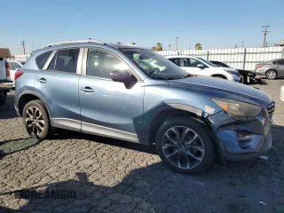 2016 Mazda CX-5 Grand Touring with VIN JM3KE2DY8G0644790, listed as a Copart auction lot 82060424 with 0 mi miles and Clean Title. Bid and sale history available at carsss.com. Image 4.