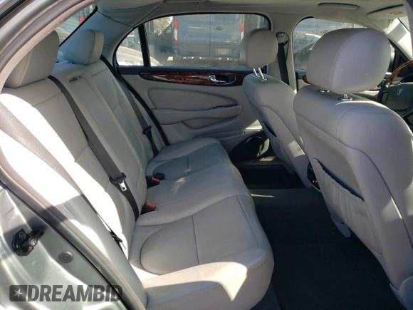 2005 Jaguar XJ with VIN SAJWA79C15SG40523, listed as a Copart auction lot 77994844 with 113,634 mi miles and Clean Title. Bid and sale history available at carsss.com. Image 10.