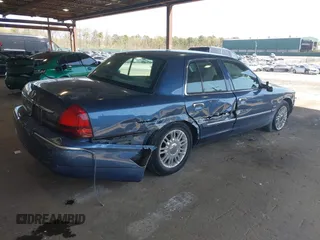 2011 Mercury Grand Marquis LS with VIN 2MEBM7FV7BX604379, listed as a IAAI auction lot 42134407 with 55,151 mi miles and . Bid and sale history available at DreamBid. Image 4.
