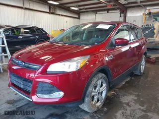2014 Ford Escape SE with VIN 1FMCU9G9XEUC23202, listed as a IAAI auction lot 41730896 with 155,058 mi miles. Bid and sale history available at carsss.com. Image 18.