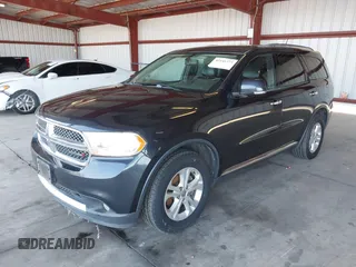 2013 Dodge Durango Crew with VIN 1C4RDHDG0DC616982, listed as a IAAI auction lot 42141275 with 178,752 mi miles. Bid and sale history available at carsss.com. Image 2.