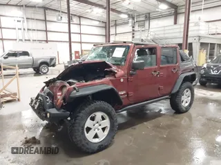 2007 Jeep Wrangler Unlimited Sahara z VIN 1J4GA59157L218278, wystawiony jako IAAI lot #41871773 z przebiegiem 145 992 mil mil oraz . Historia ofert i sprzedaży dostępna na DreamBid. Obrazek 2.
