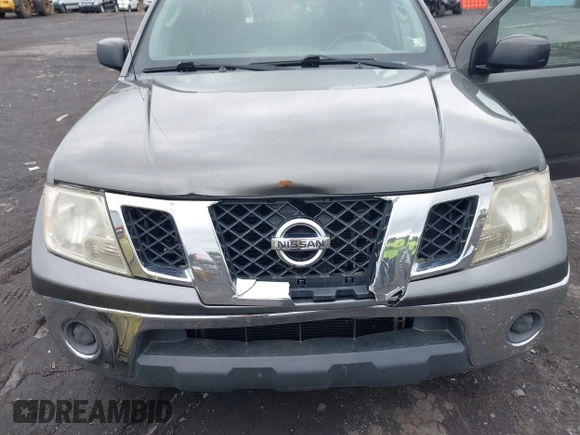 2009 Nissan Frontier SE with VIN 1N6AD06WX9C408504, listed as a IAAI auction lot 42193225 with 261,708 mi miles and . Bid and sale history available at DreamBid. Image 6.