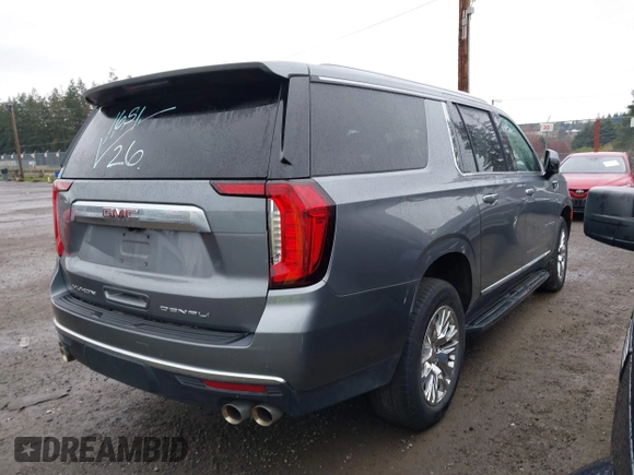 2022 GMC Yukon XL Denali with VIN 1GKS2JKL1NR208671, listed as a IAAI auction lot 39140703 with 28,235 mi miles and . Bid and sale history available at carsss.com. Image 4.