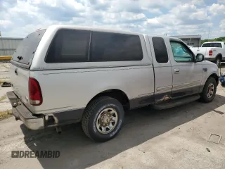 1999 Ford F-250 with VIN 1FTRX27LXXNC18863, listed as a Copart auction lot 63051395 with 118,695 mi miles and Clean title. Bid and sale history available at DreamBid. Image 3.