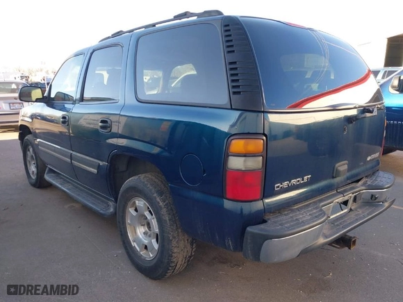 2005 Chevrolet Tahoe LS with VIN 1GNEC13V25R173054, listed as a IAAI auction lot 41616086 with 202,736 mi miles. Bid and sale history available at carsss.com. Image 3.