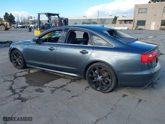2014 Audi A6 3.0T Prestige with VIN WAUHGAFC7EN036961, listed as a IAAI auction lot 41741972 with 113,642 mi miles. Bid and sale history available at carsss.com. Image 3.