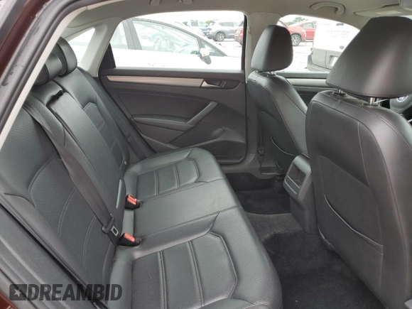 2014 Volkswagen Passat Wolfsburg Edition with VIN 1VWAS7A30EC028920, listed as a Copart auction lot 57174285 with 129,797 mi miles and Salvage title. Bid and sale history available at DreamBid. Image 10.