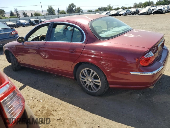 2003 Jaguar S-Type z VIN SAJEA01U13HM90556, wystawiony jako Copart lot #59578535 z przebiegiem 50 723 mil mil oraz Czysty tytuł • Clean title. Historia ofert i sprzedaży dostępna na DreamBid. Obrazek 2.