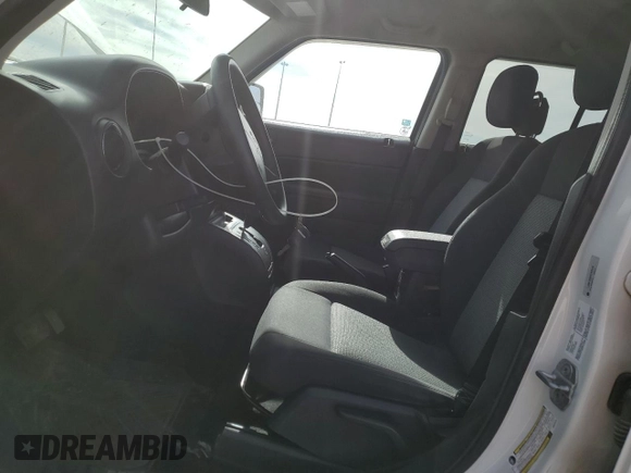 2010 Jeep Patriot Sport with VIN 1J4NF2GB2AD525475, listed as a Copart auction lot 51986785 with 90,659 mi miles and Salvage Title. Bid and sale history available at carsss.com. Image 7.