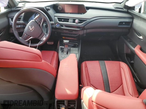 2021 Lexus UX with VIN JTHR9JBH2M2049747, listed as a Copart auction lot 43319555 with 22,606 mi miles and Salvage Title. Bid and sale history available at carsss.com. Image 8.