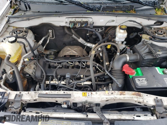 2008 Ford Escape XLS с VIN 1FMCU92Z88KB10257, выставлен на аукционе Copart как лот 56427925 с пробегом 117 042 миль миль и Чистый • Clean title. История ставок и продаж доступна на DreamBid. Изображение 11.