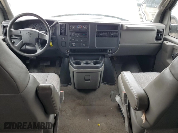 2007 Chevrolet Express Passenger with VIN 1GAHG39U771237121, listed as a Copart auction lot 60245775 with 187,005 mi miles and Salvage title. Bid and sale history available at DreamBid. Image 8.