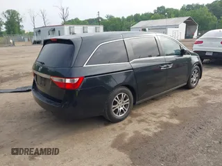 2011 Honda Odyssey EX-L with VIN 5FNRL5H68BB071178, listed as a IAAI auction lot 42286324 with 213,847 mi miles and . Bid and sale history available at DreamBid. Image 4.